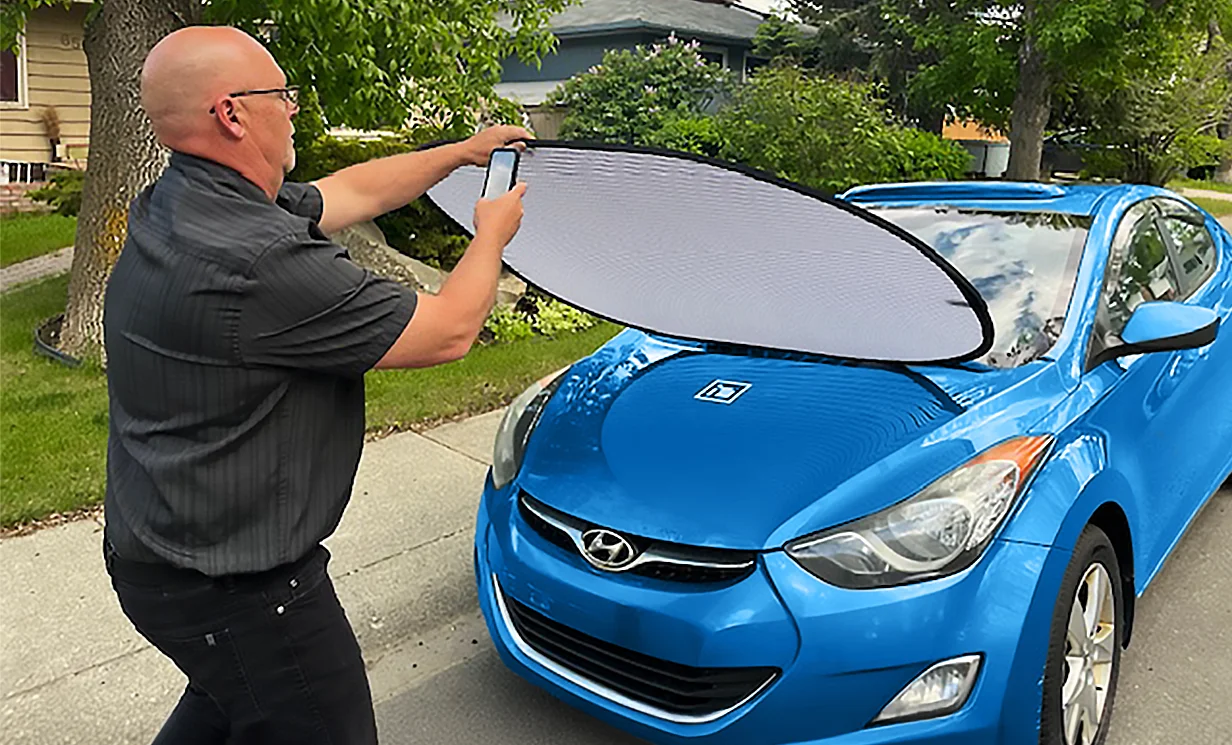 ihshome-hero-btns-hailLogix Hail techs working on a line of cars